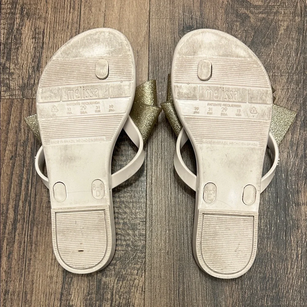 Mel, Dreamed by Melissa Cream Sandals with Gold Bow harmonic bow III